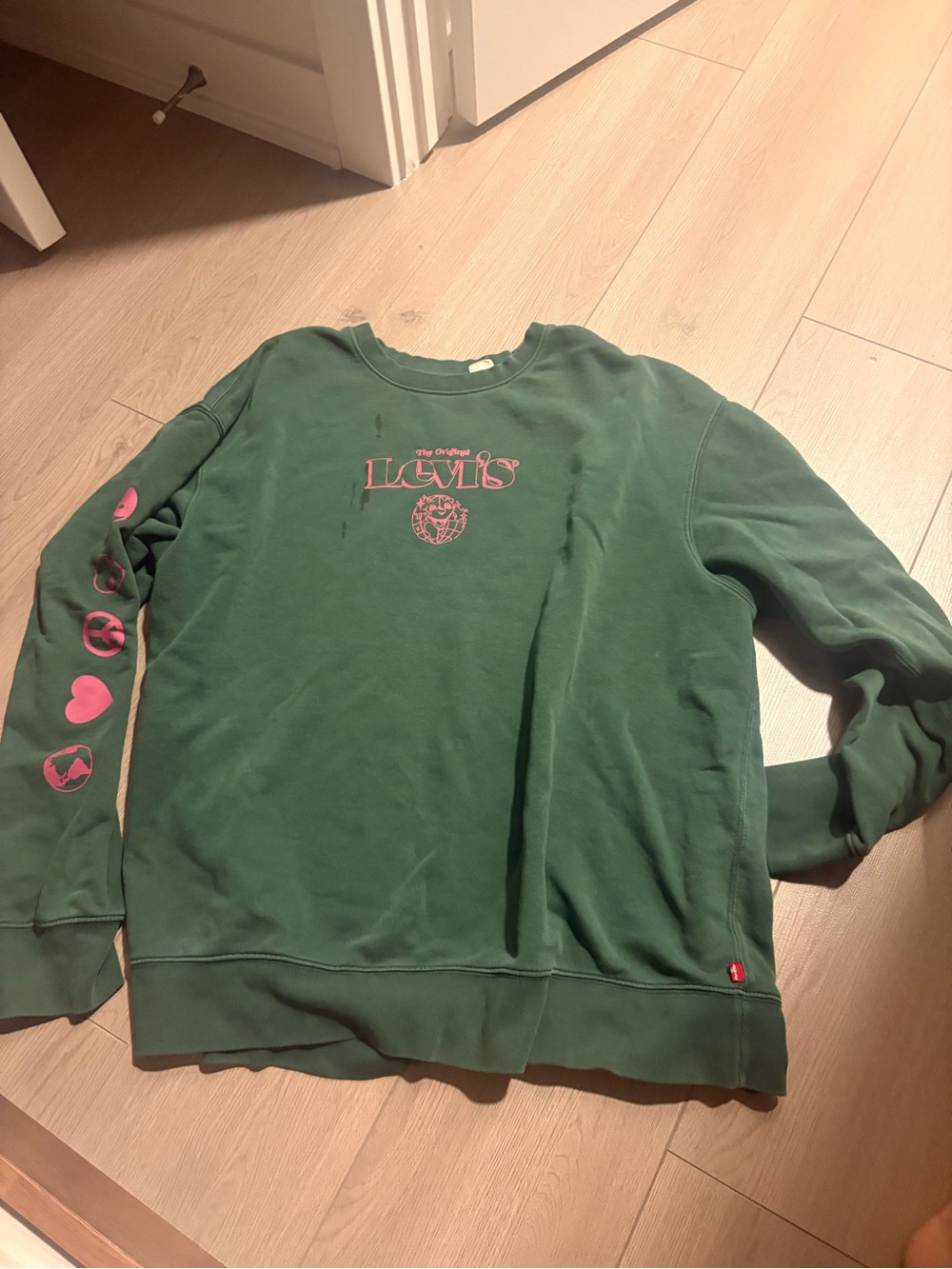 Levi's Forest Green Sweatshirt with Pink Graphic Accents